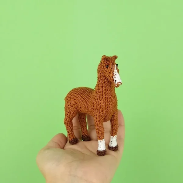 Brown Horse Amigurumi frontal view on holding hand