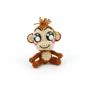 Kawaii Monkey Crochet Amigurumi over white background