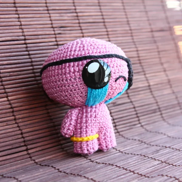 Binding of Isaac Cain Crochet Amigurumi side view over brown background