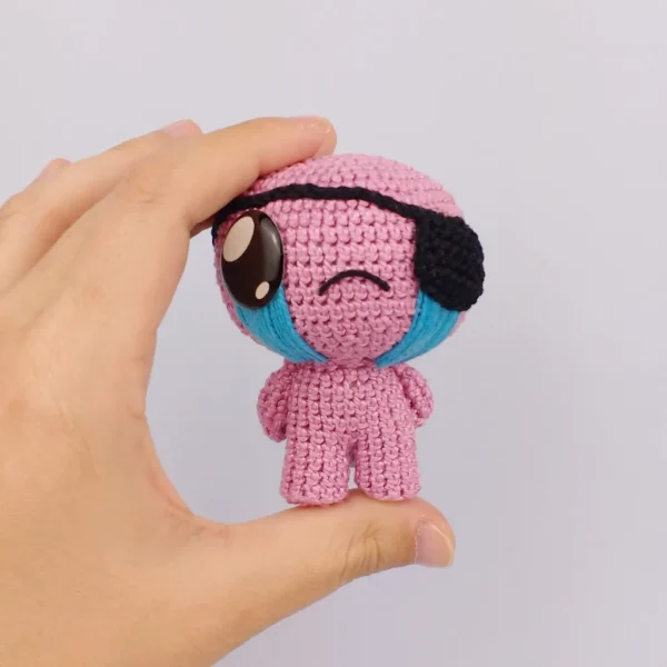 Binding of Isaac Cain Crochet Amigurumi on holding hand