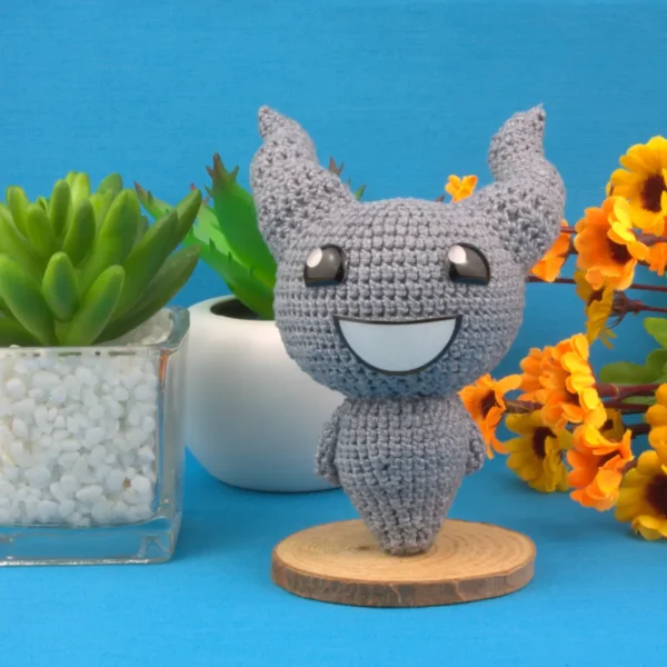 Binding of Isaac Lil Brimstone Crochet Amigurumi over blue background