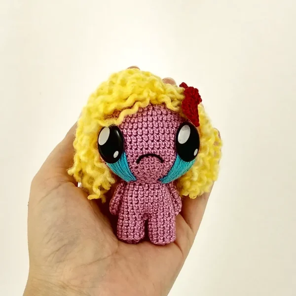 Binding of Isaac Magdalene Crochet Amigurumi on holding hand