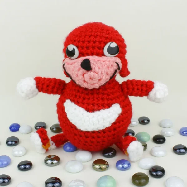 Ugandan Knuckles XL Crochet Amigurumi sitting with pearls front view