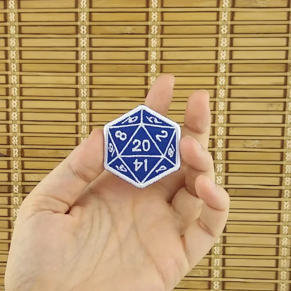 Blue d20 dice Embroidered Patch holding in hand