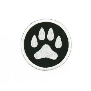 Dog Paw Embroidered Patch in Black and White over white background