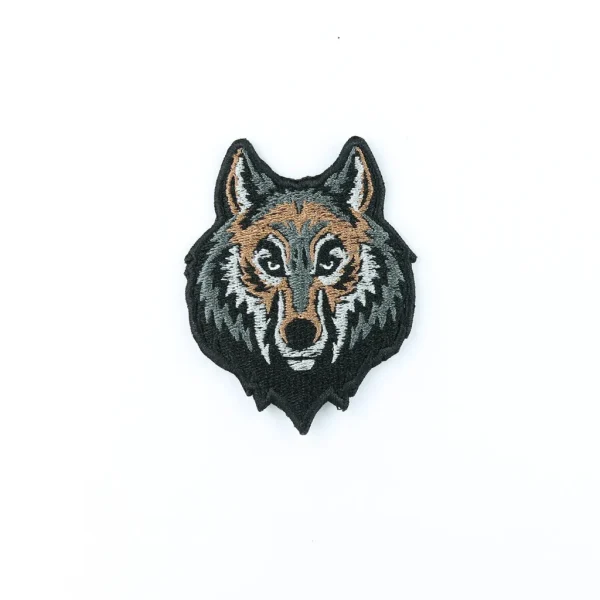 Wolf Head Embroidered Patch over white background