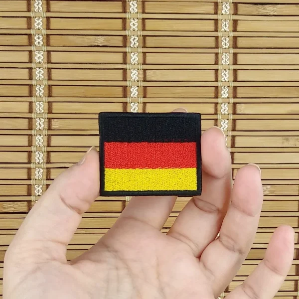 Germany Flag Embroidered Patch on holding hand