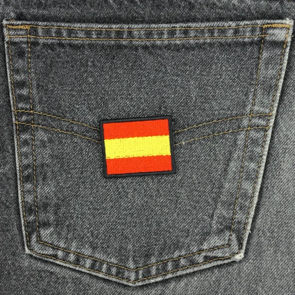 Spain Flag Embroidered Patch on black jeans