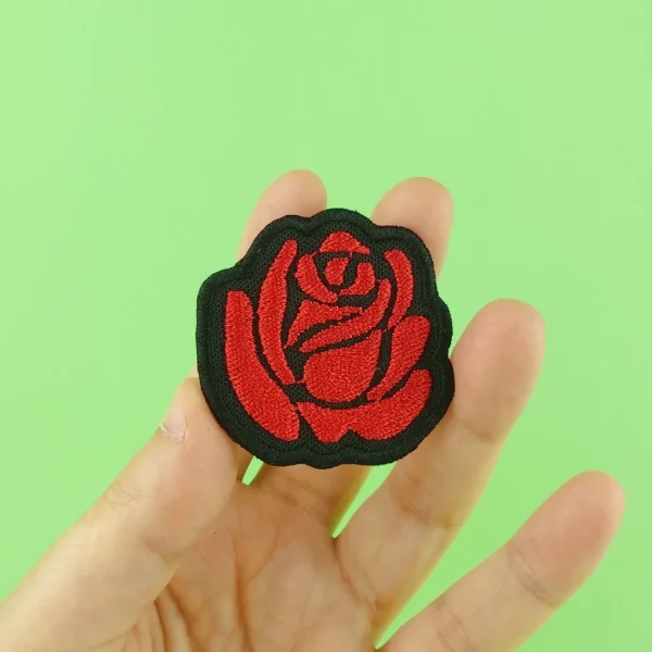 Red Rose Tattoo Embroidered Patch on holding hand