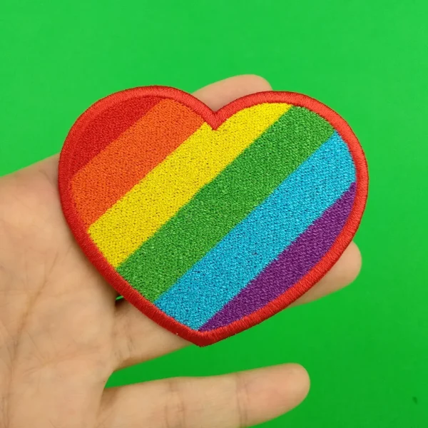 Rainbow Heart Embroidered Patch on holding hand