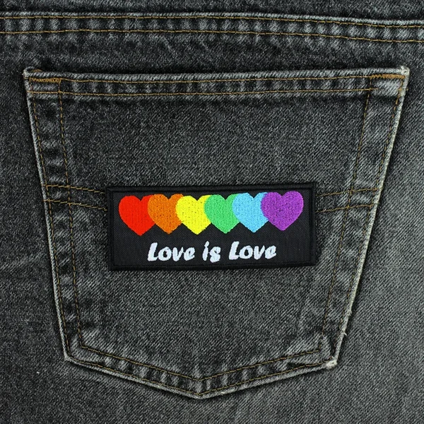 Rainbod Hearts Love is Love Embroidered Patch on black jeans