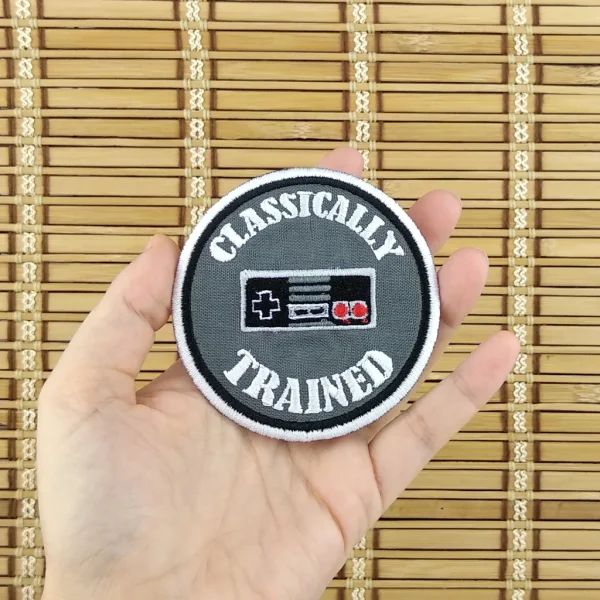 nes controller Classically Trained 8-bits Embroidered Patch on holding hand