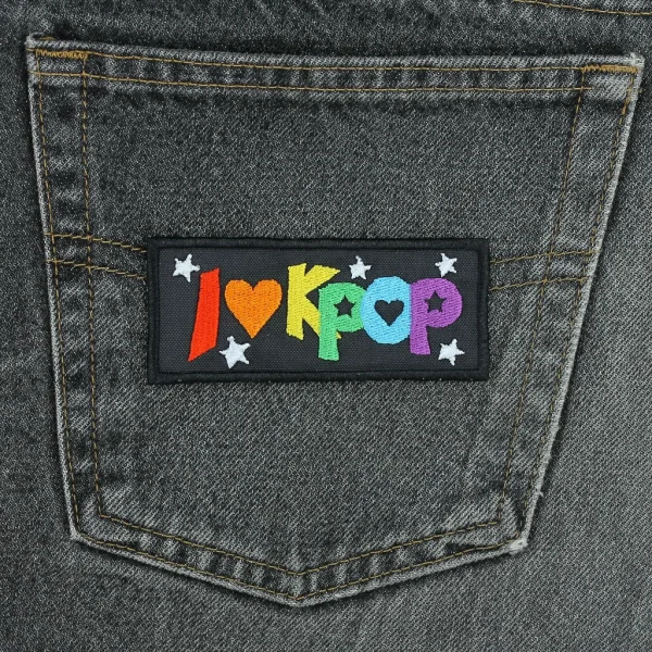 I Love Kpop Rainbow Embroidered Patch on black jeans