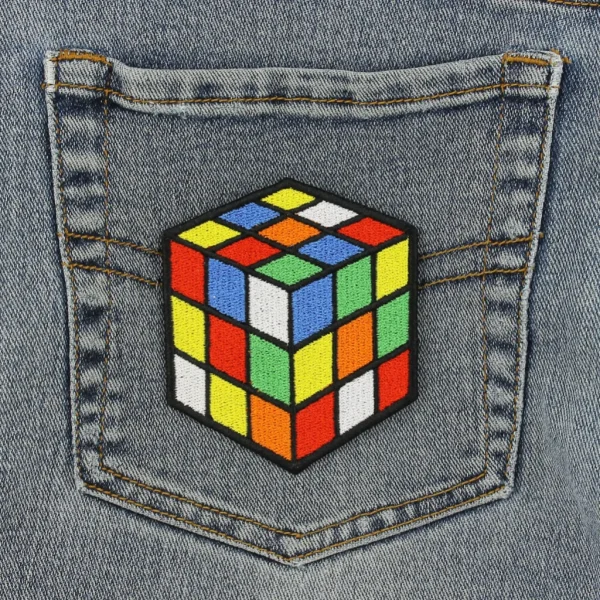 Puzzle Rubik's Cube Embroidered Patch on black jeans