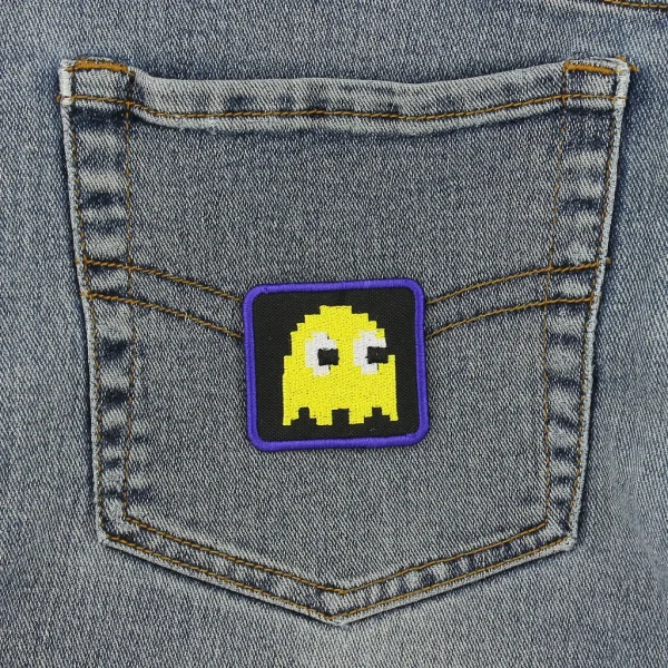 Yellow Pixel Ghost Embroidered Patch on black jeans