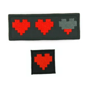 Pixel Hearts Embroidered Patch over white background