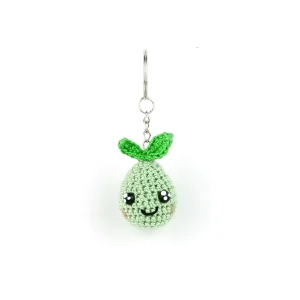 Lost Ark green Mokoko Keychain over white background