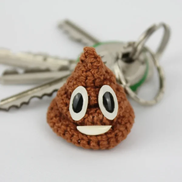 Pile of Poo Keychain close up with keys