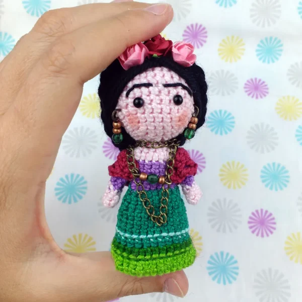 Mexican Doll Crochet Amigurumi on holding hand