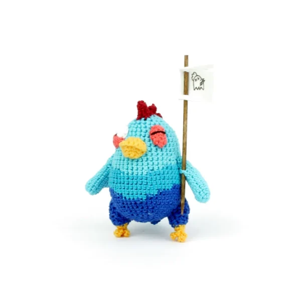 Blue Chicken Crochet Amigurumi holding a flag over white background