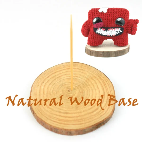 Super Meat Boy Crochet Amigurumi and natural wood base over white background