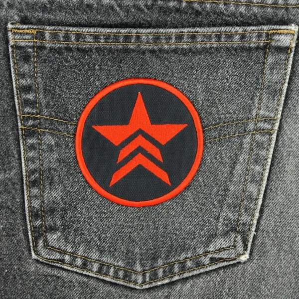 Medium Renegade Logo Embroidered Patch on black jeans