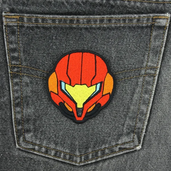 Metroid Red Sci-Fi Helmet Embroidered Patch on black jeans