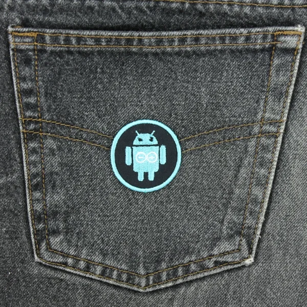 Android Arduino Embroidered Patch on black jeans