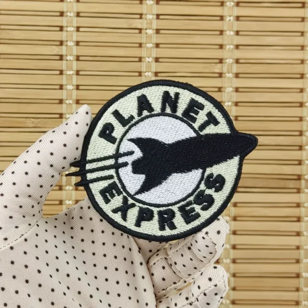 Planet Express Embroidered Patch on holding hand