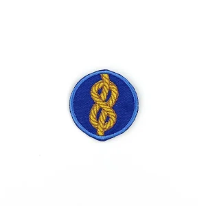 Scout Knot Embroidered Patch over white background