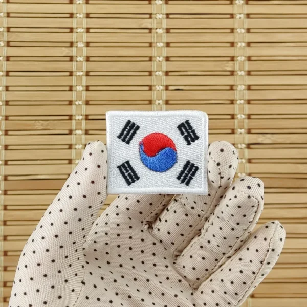 South Korea Flag Embroidered Patch on holding hand