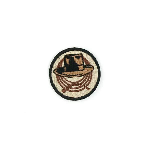 Hat and Whip Embroidered Patch over white background