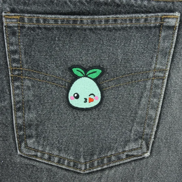 Mokoko Emote Embroidered Patch kiss on black jeans