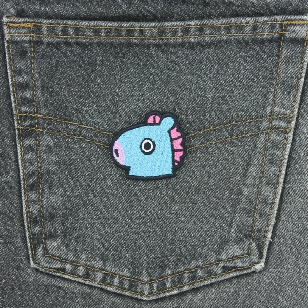 Kawaii Blue Horse Embroidered Patch on black jeans