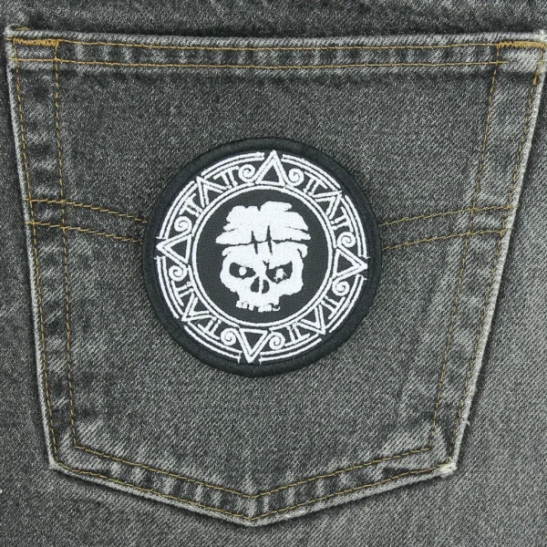 Tribal Pirate Skull Embroidered Patch on black jeans