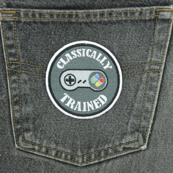 SNES controller Classically Trained 16-bits Embroidered Patch on black jeans