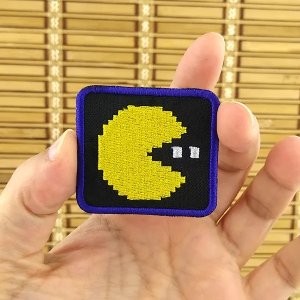 Pac Man Pixel Ball Eater Embroidered Patch on holding hand