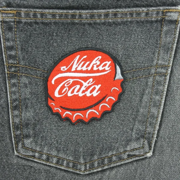 medium Fallout Nuka Cola Cap Embroidered Patch on black jeans