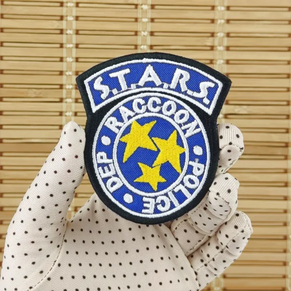 Racoon Police badge Embroidered Patch on holding hand