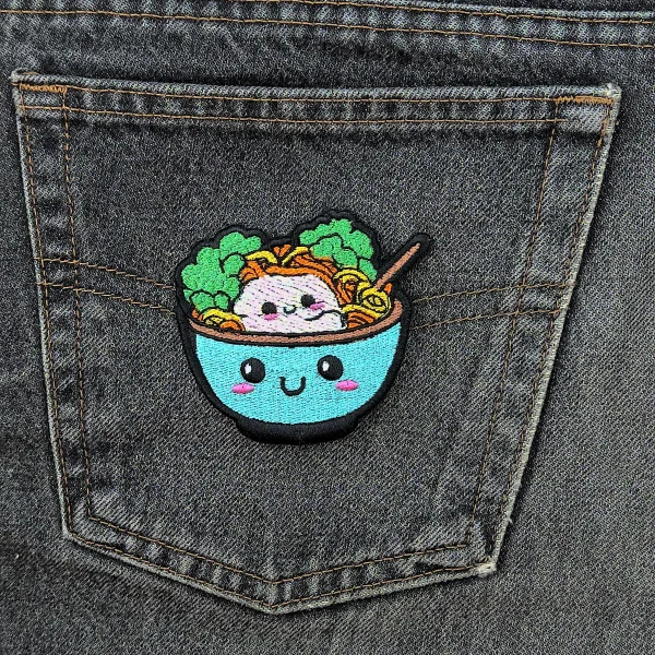 Kawaii Ramen Embroidered Patch on black jeans