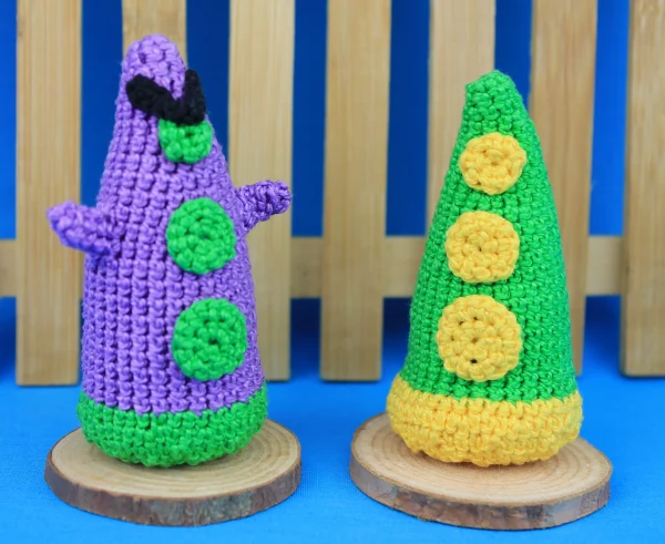 Couple of twi Evil Tentacle Crochet Amigurumi over colorful background