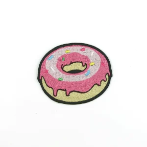 Pink Donut Embroidered Patch over white background