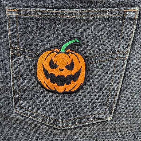 mediuim Evil Pumpkin Embroidered Patch on black jeans