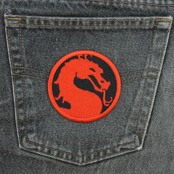 Red Dragon Embroidered Patch on black jeans