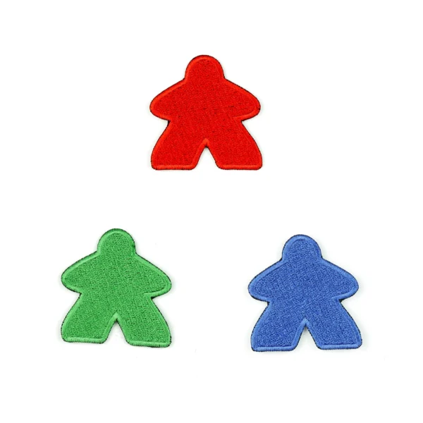 Multi-colored board game pieces (meeple) embroidered patch on white background