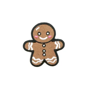 christmas gingerbread cookie embroidery patch over white background