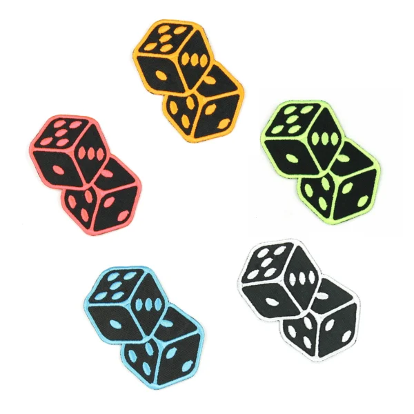 Various 6-sided dice embroidered patches in various colors on white background